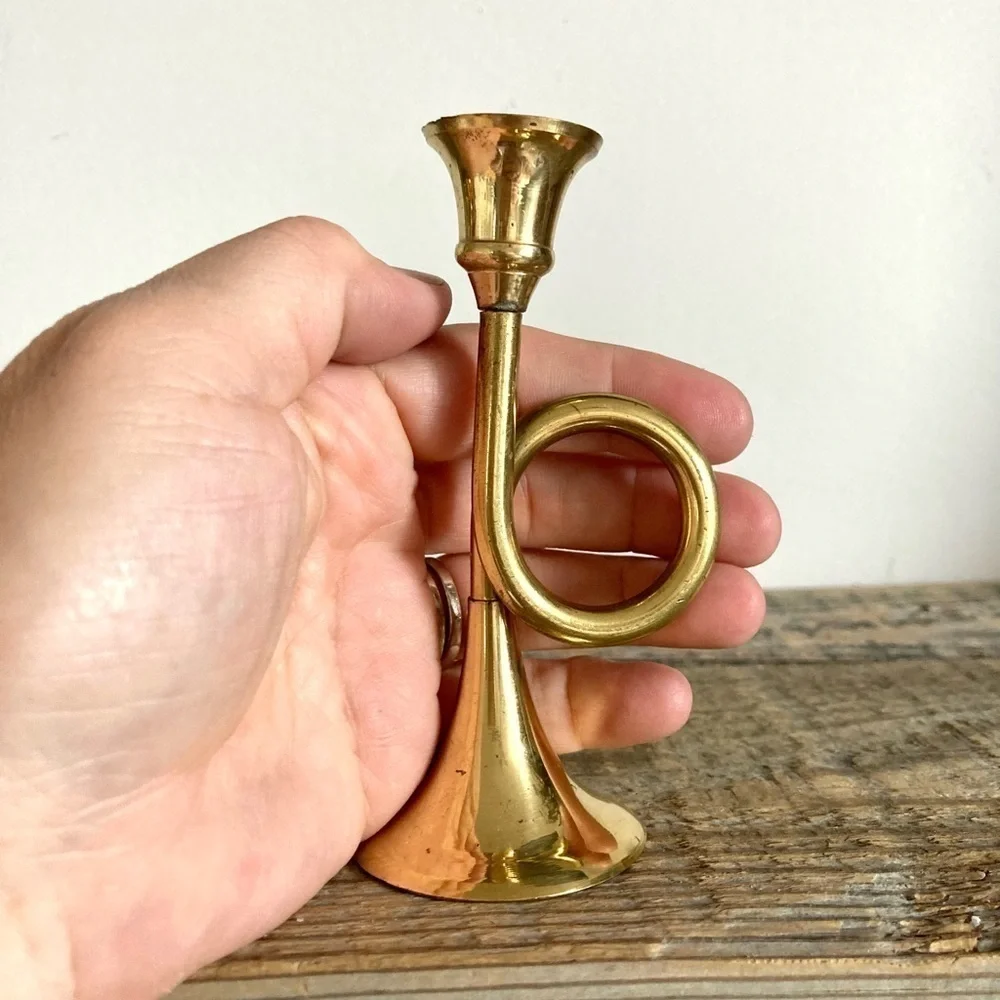 Small brass bugle candlestick